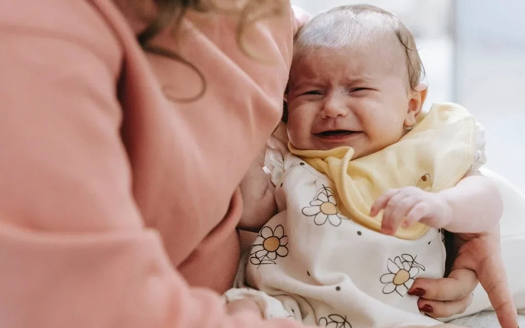 Why Does My Baby Pull Away And Cry While Breastfeeding?